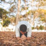 man kneeling